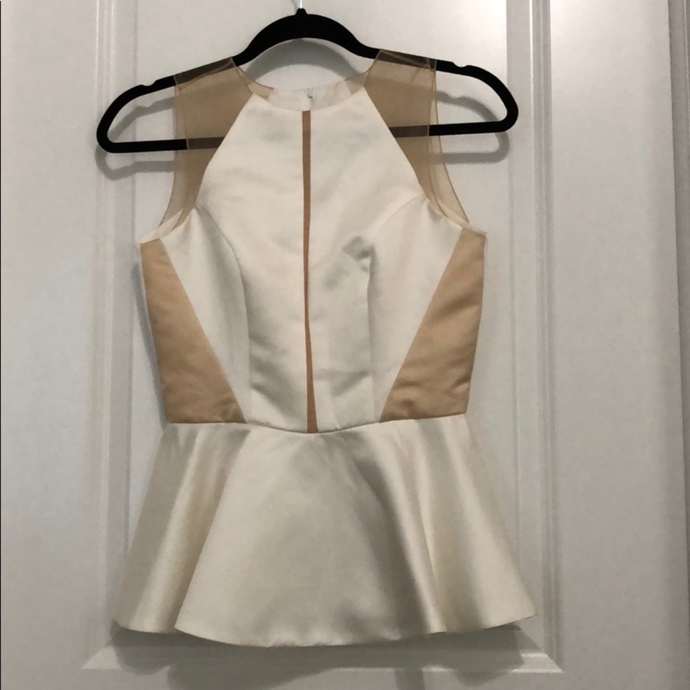 White Peplum Top with mesh.